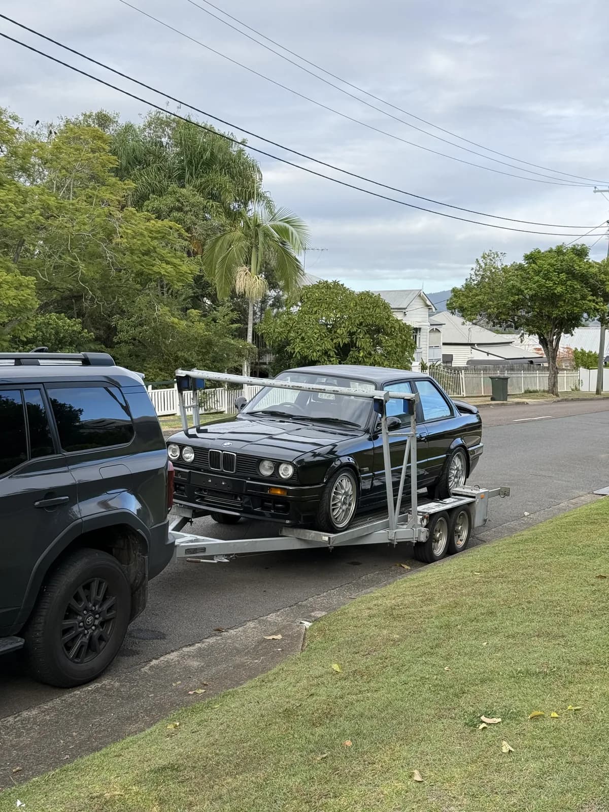 A BMW E30 M3 loaded on the trailer during the Brisbane trip