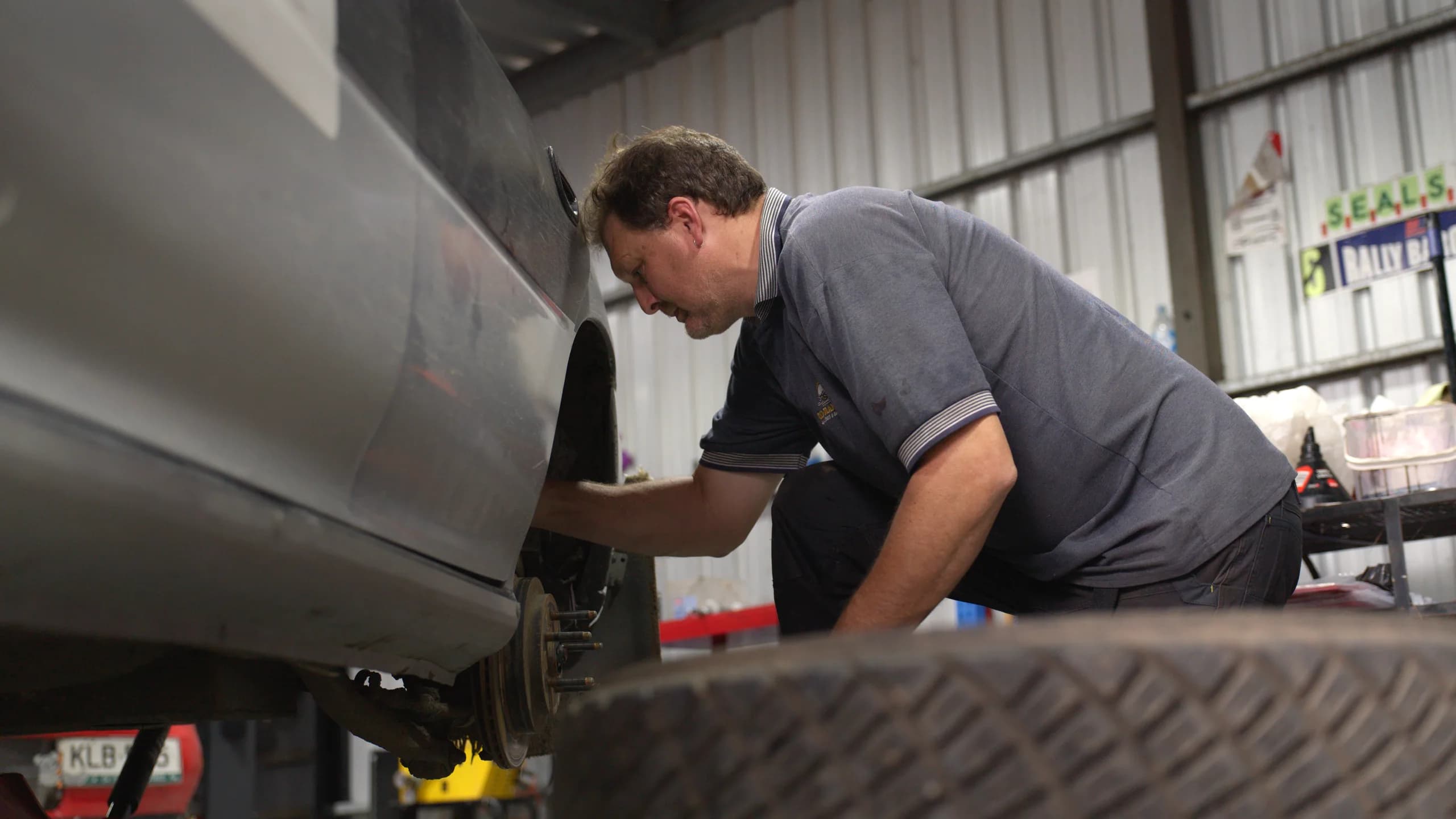 Working underneath the wagon in the shed before the MSS Safety Rally Barossa