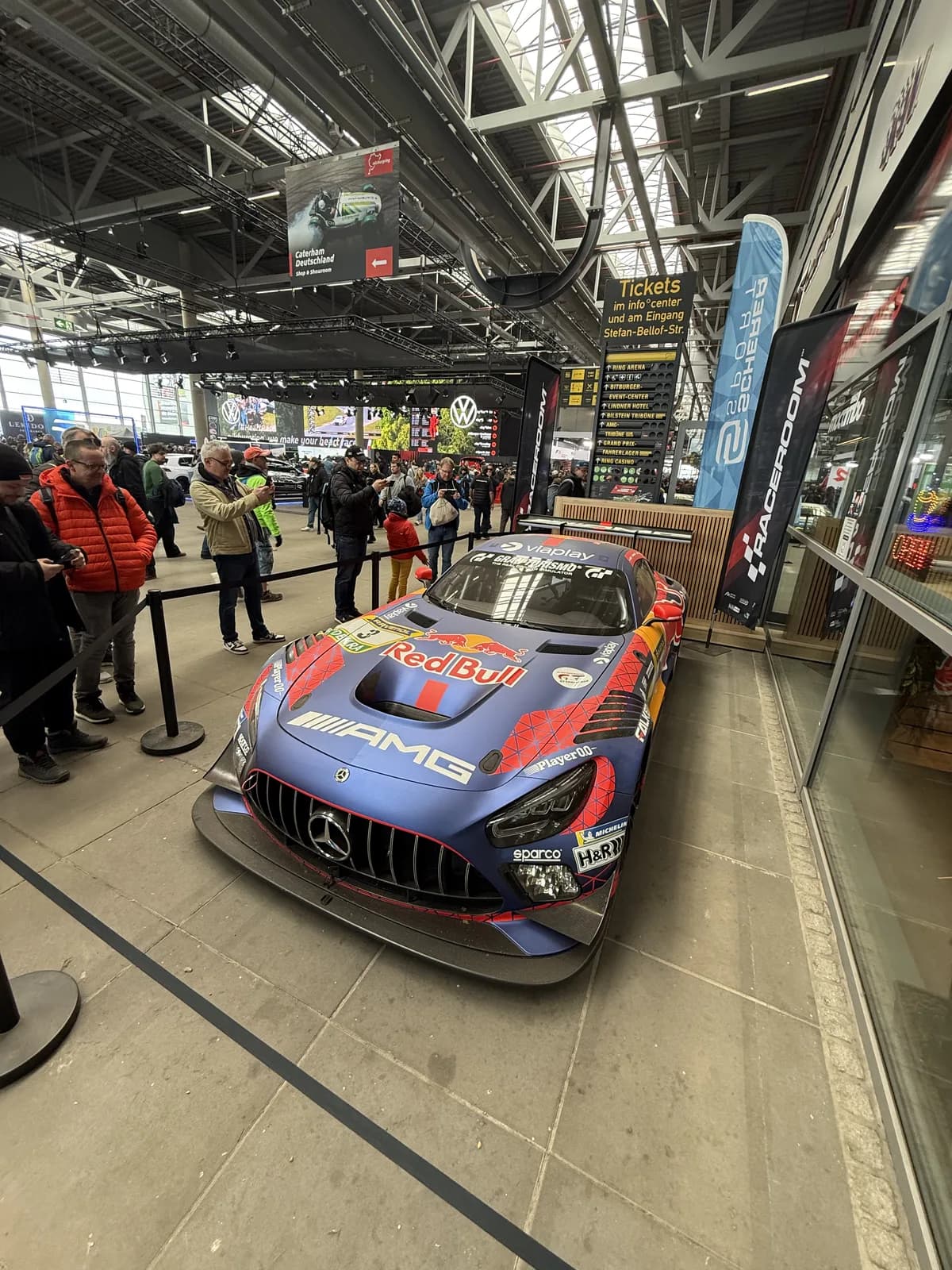 A Mercedes-AMG GT3 race car on display at the Nürburgring
