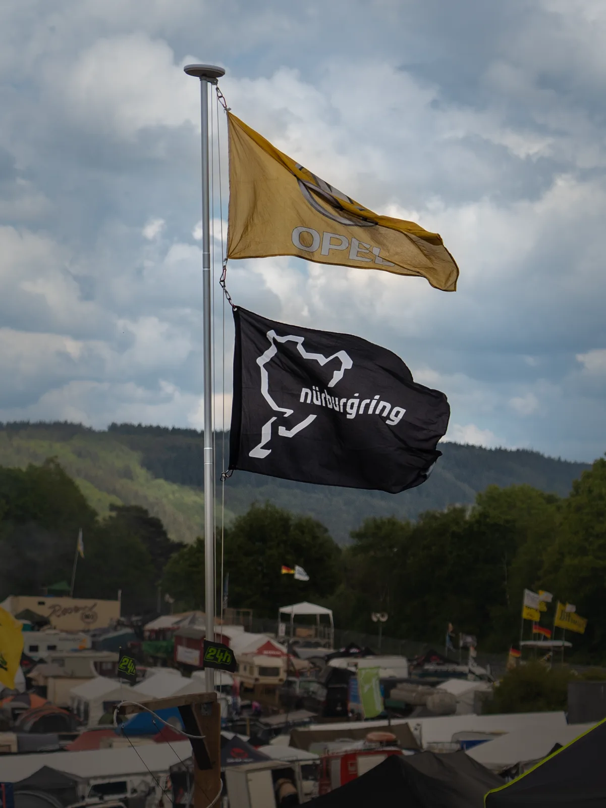 Nürburgring flags flying over the campsites during the Nürburgring 24 Hours