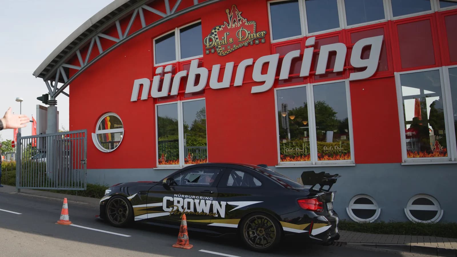 A Crown-liveried BMW parked outside the Devil's Diner at the Nürburgring