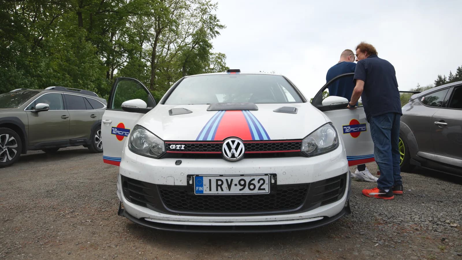 A Martini-liveried Volkswagen Golf GTI in the car park at the Nürburgring