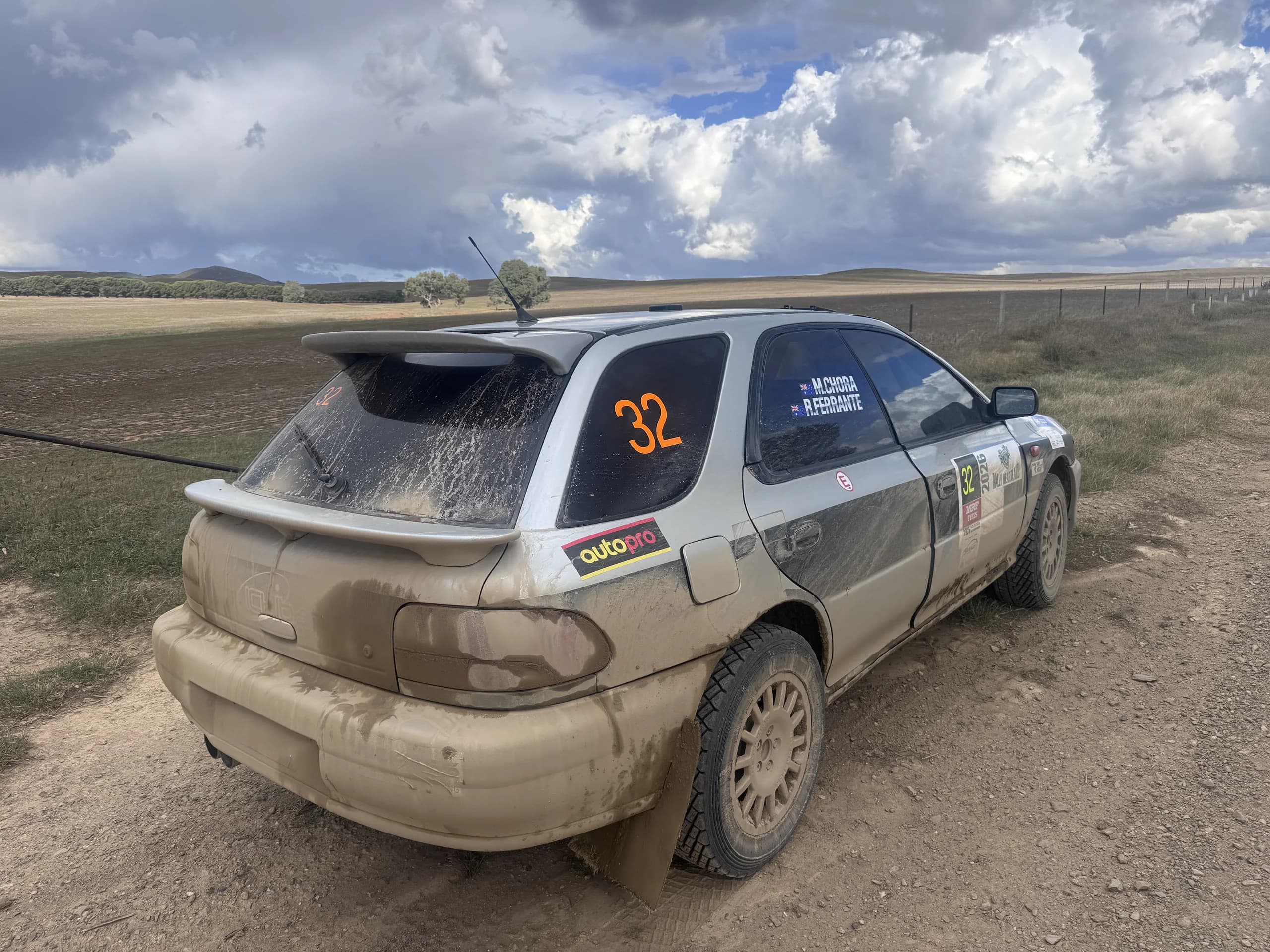 Mud-caked Subaru Impreza after a wet stage at the three-day Rally of the Heartland