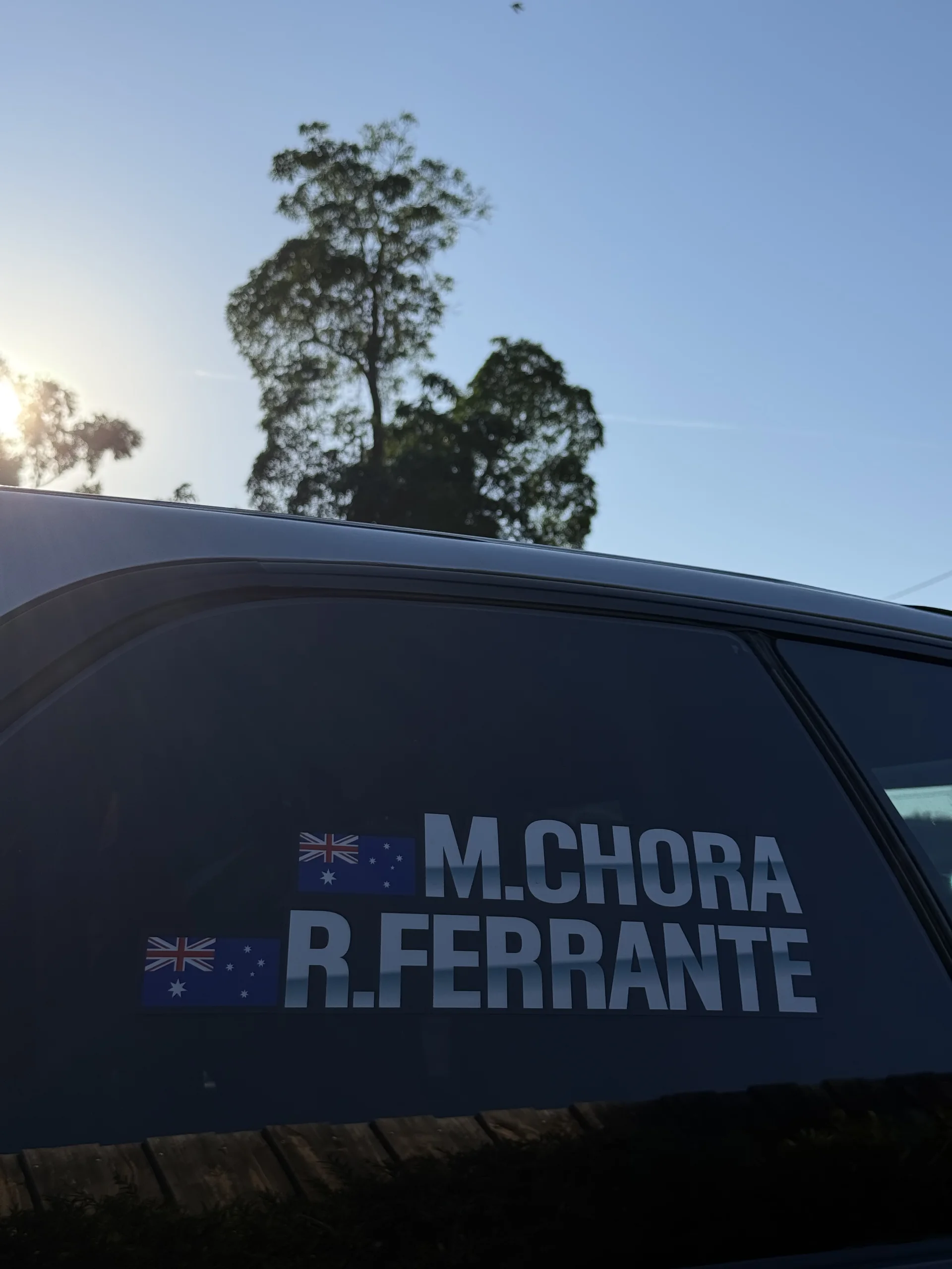 The M.Chora and R.Ferrante window decals on car 32 at the Rally of the Heartland