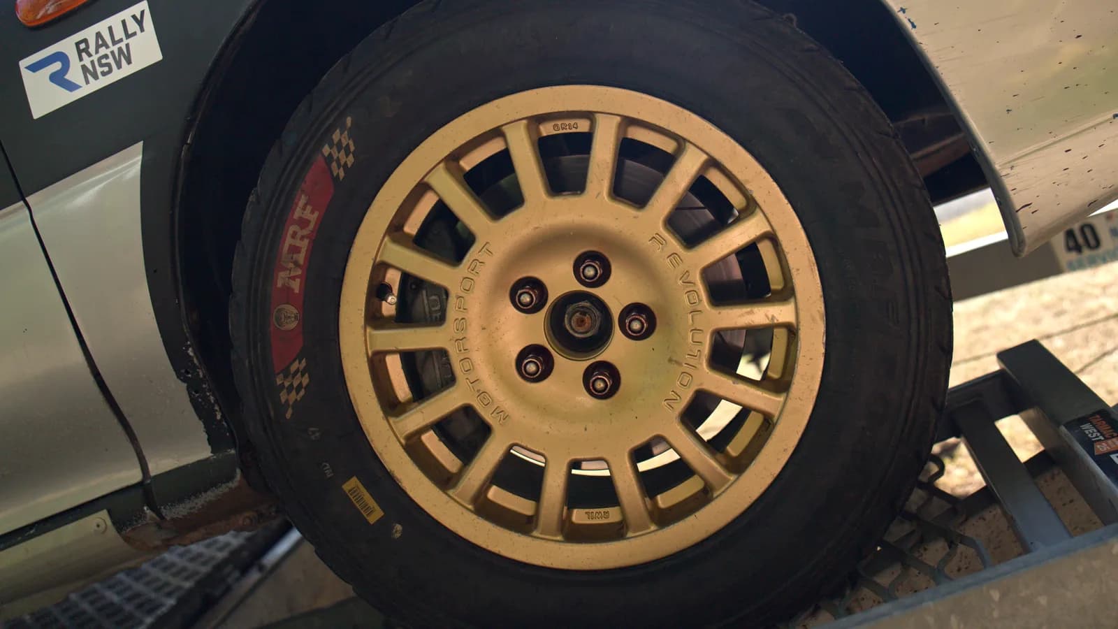 Gold rally wheel and gravel tyre on the Shakewell Racing Impreza at the Imbil Rally