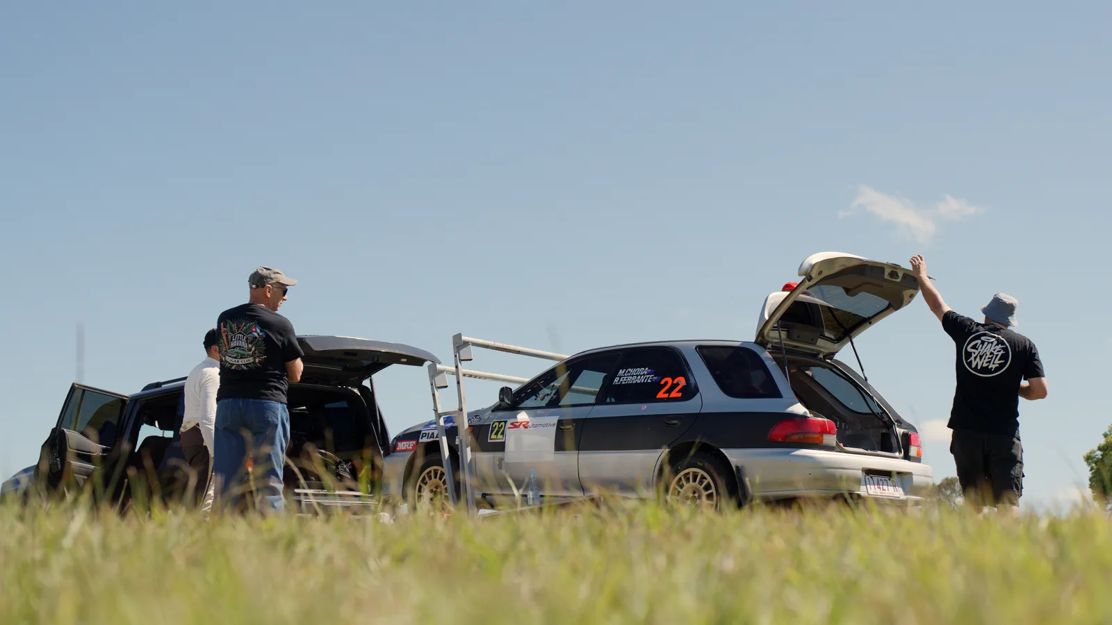 The crew around car 22 in the service park at the Imbil Rally