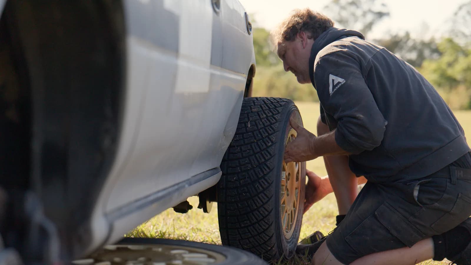 Changing a wheel on the Shakewell Racing Impreza at the Imbil Rally