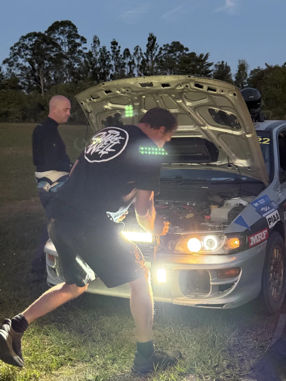 Working on the Impreza by headlight after Saturday’s stages at the Imbil Rally