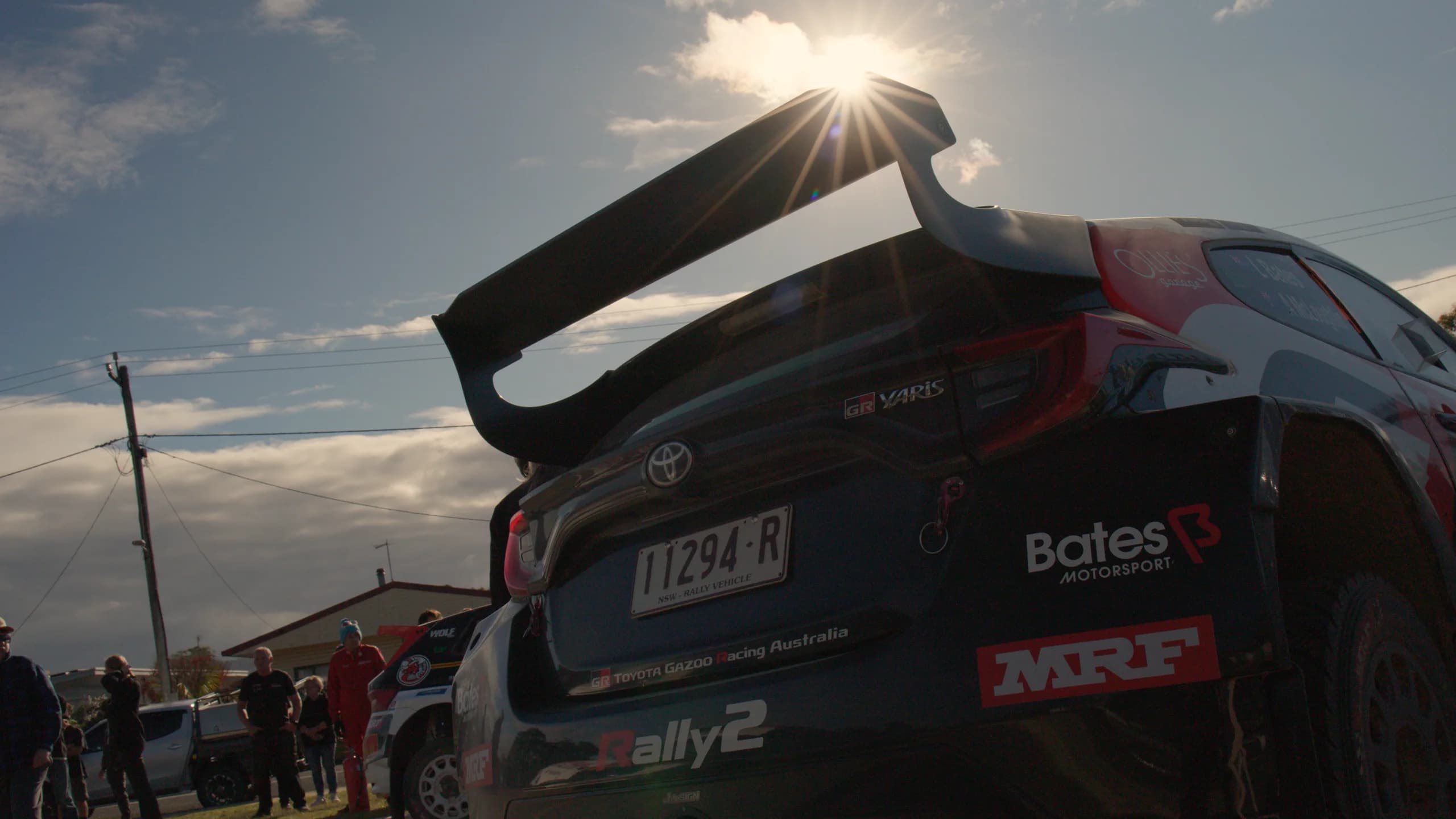Low angle under the rear wing of the Shakewell Racing Impreza at sunset at Narooma