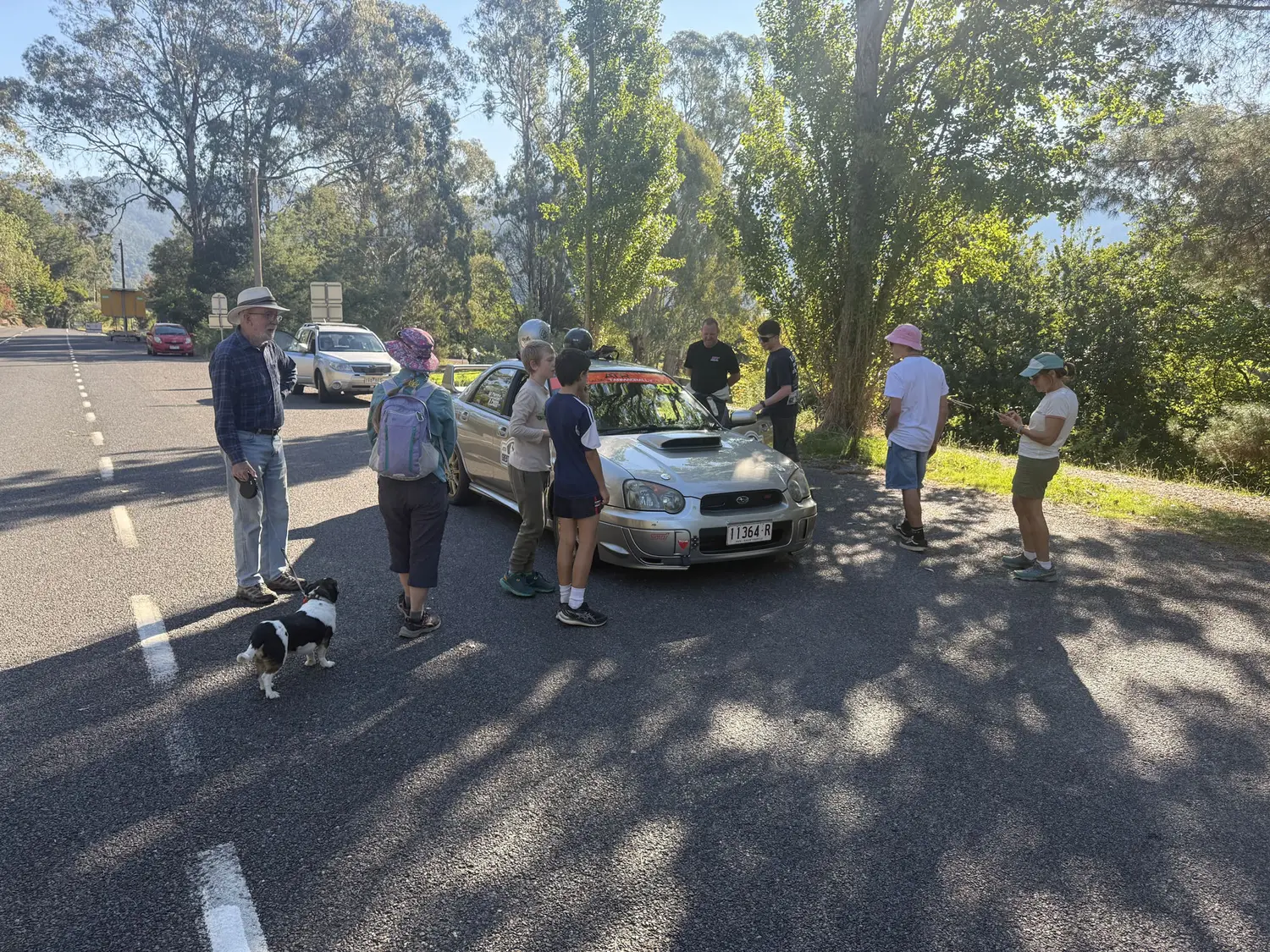 The Shakewell Racing WRX STI stopped at the bottom of the mountain after the turbo let go, with locals gathered around